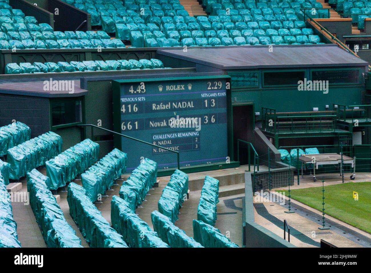 London, England - Aril 5, 2012: Wimbledon tennis stadium. Tennis centre court with empty seats in London, UK. Stock Photo