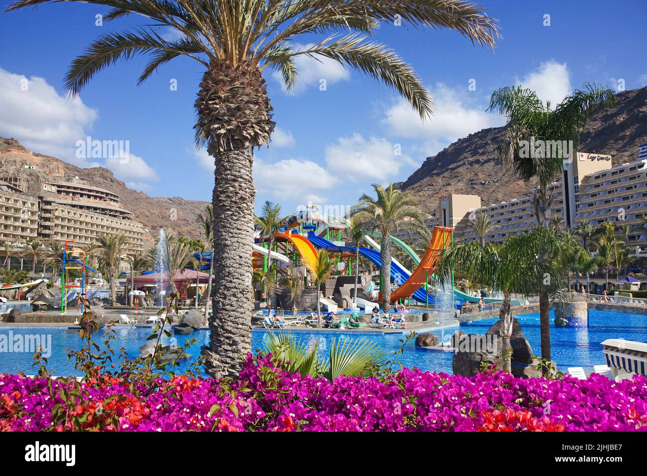Hotel pool with water slides, hotel in Taurito, Grand Canary, Canary islands, Spain, Europe Stock Photo
