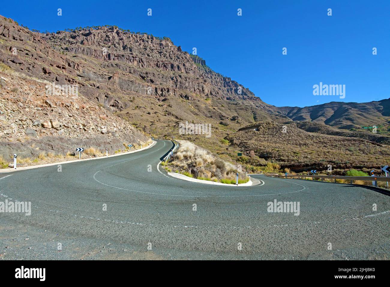 Curvy road at the rough west coast, Agaete, Grand Canary, Canary islands, Spain, Europe Stock Photo