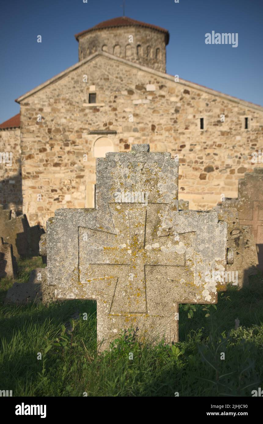 variants of the Greek cross on a Serbian Orthodox cross in the cemetery of medieval church of Saint Apostles Peter and Paul in Serbia Stock Photo