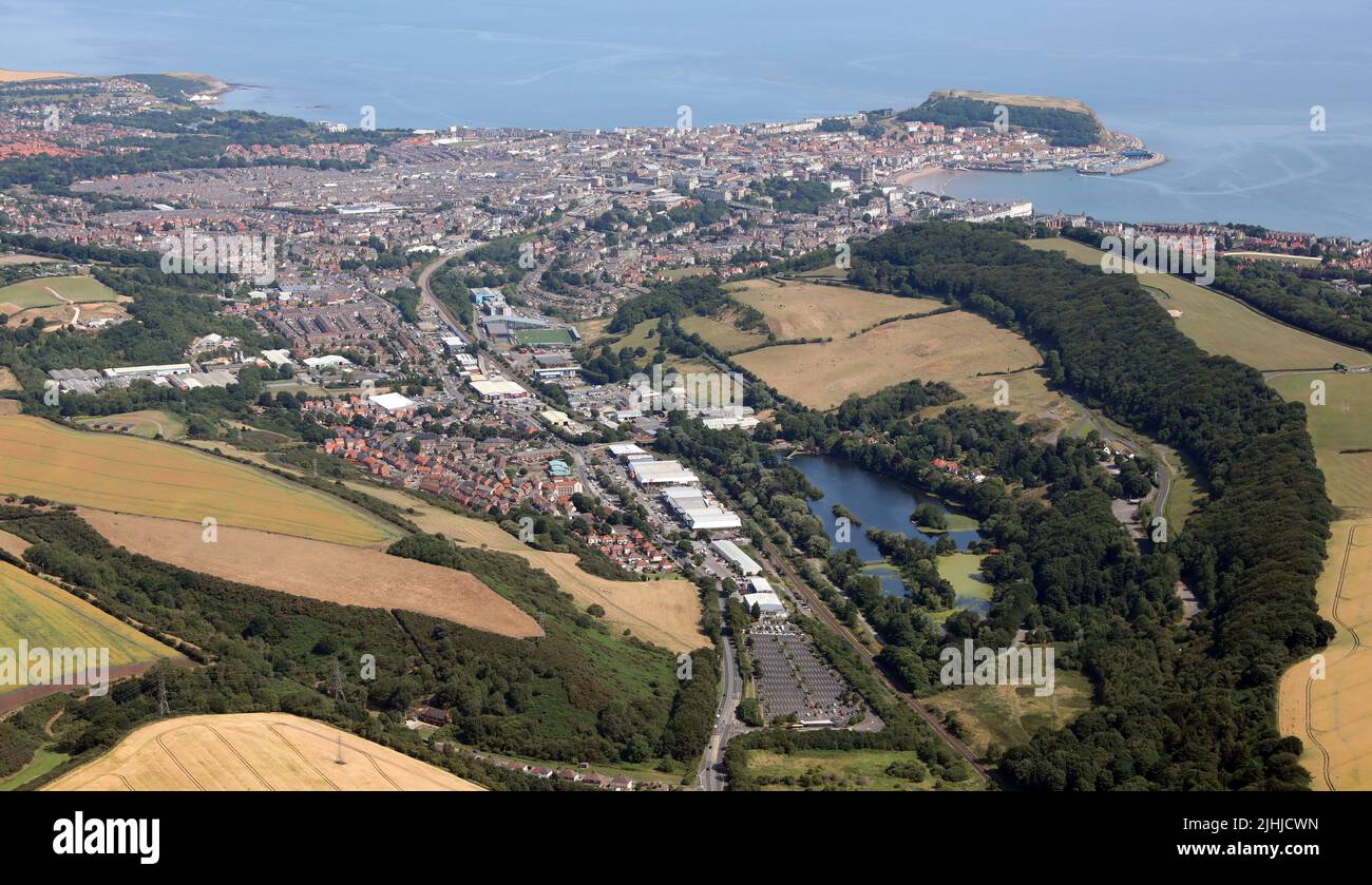 aerial view of Scarborough town skyline from the SW looking up the A64 Seamer Roa with the headland, Scarborough Castle & North Sea in the background Stock Photo