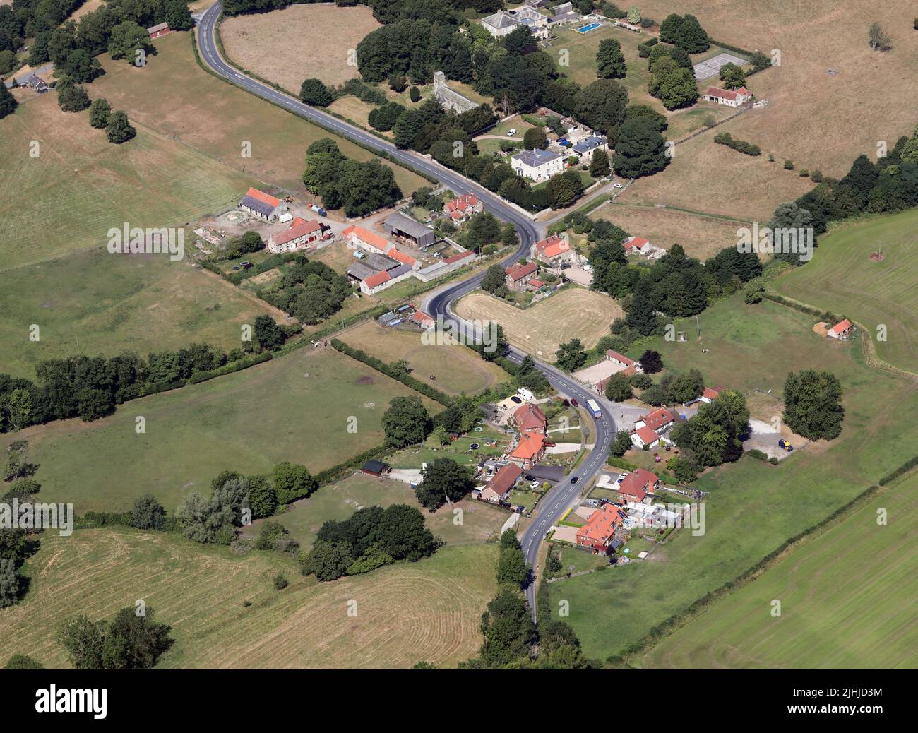aerial view of North Grimston village in the Ryedale district of North Yorkshire, UK Stock Photo