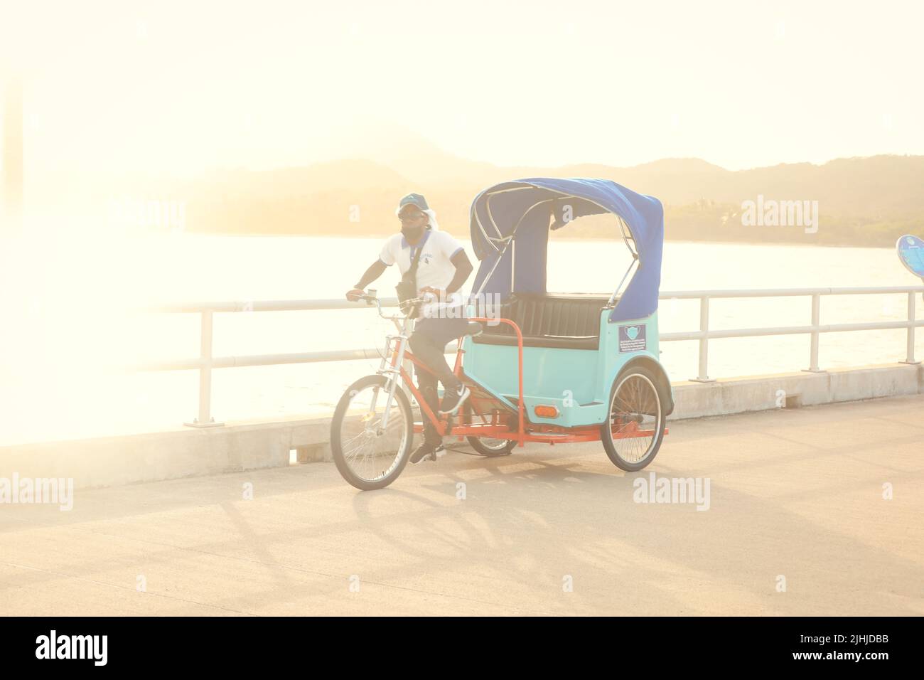 Bicycle rickshaw transferring guests from cruise ship terminal complex