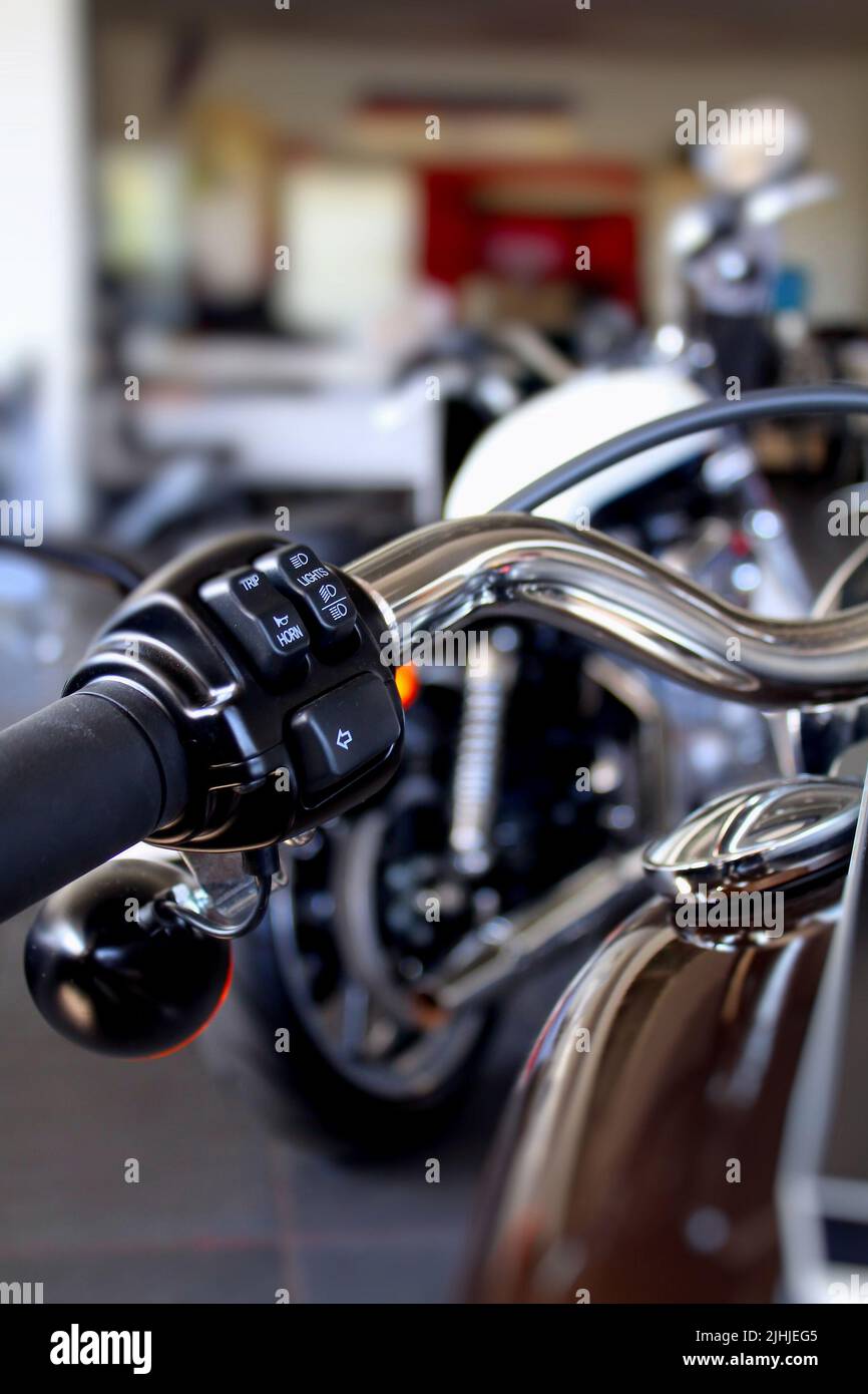 Control Buttons On A Chrome Motorcycle Handlebar At Motorbike Showroom