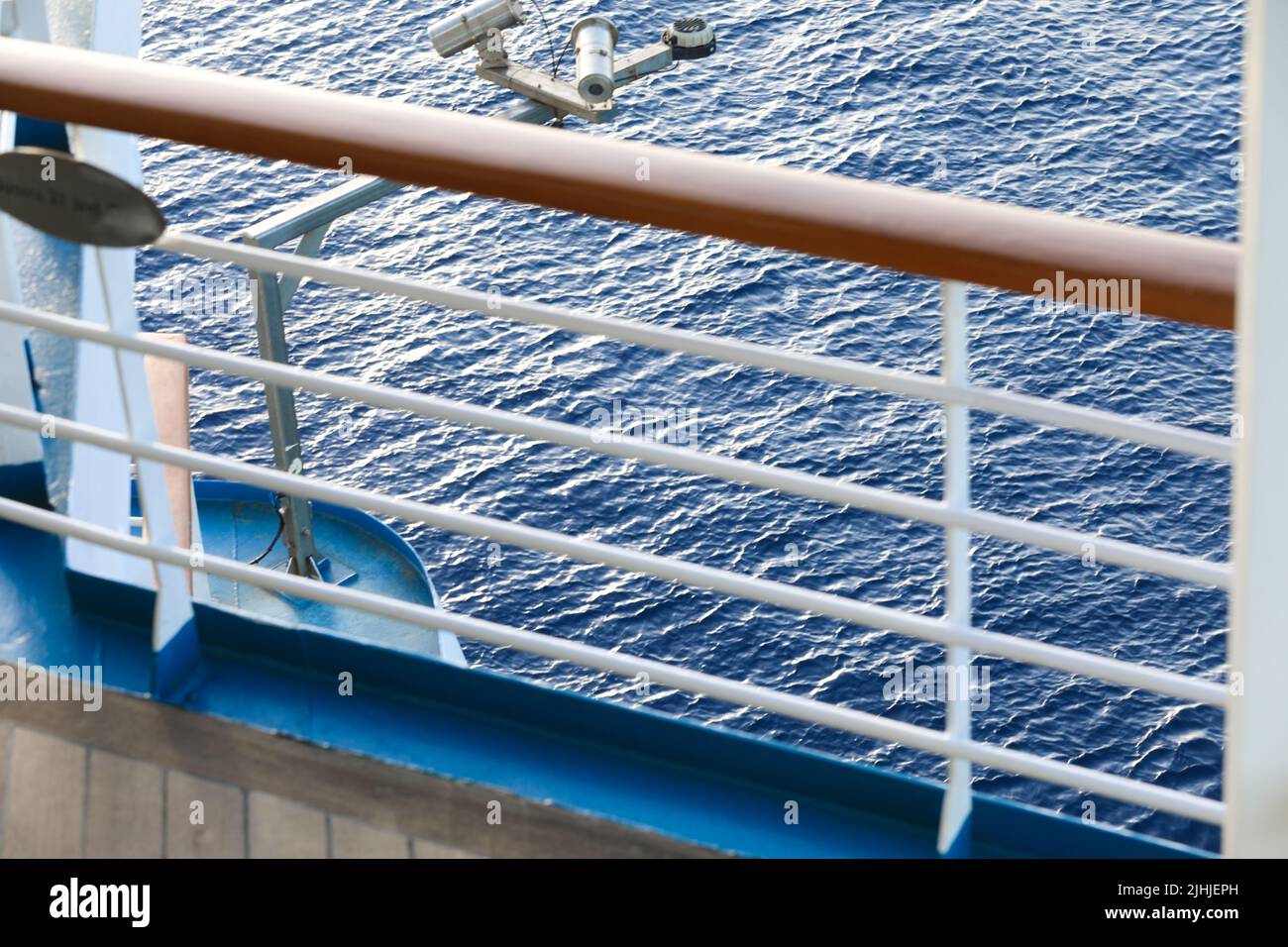 Railing of cruise ship with ocean view Stock Photo Alamy
