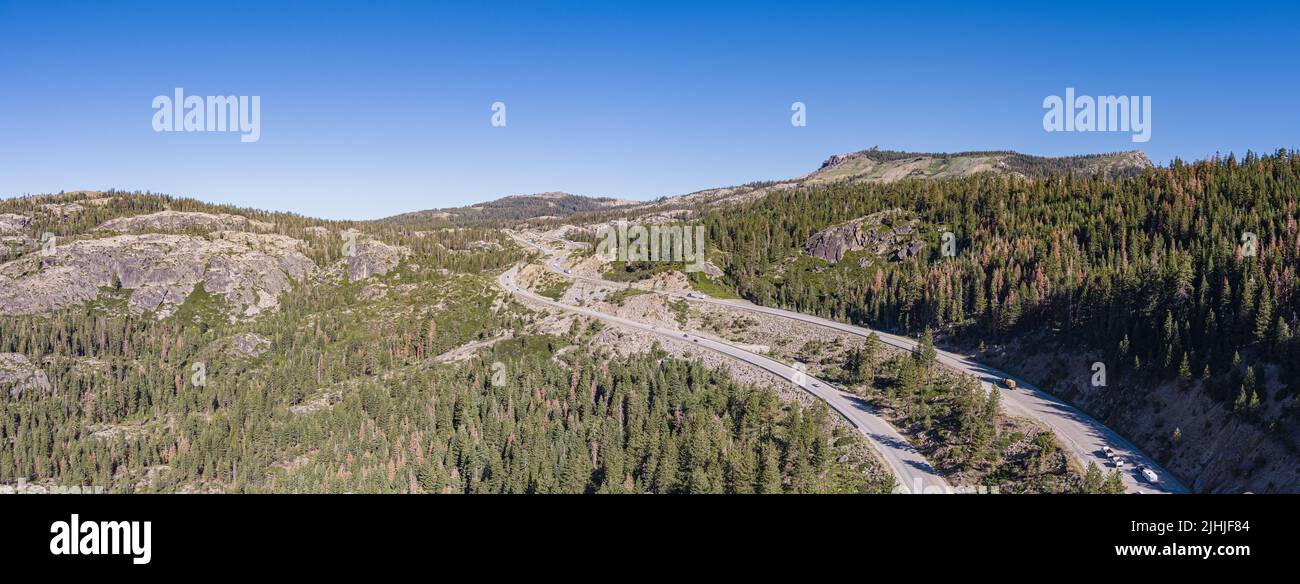 Long view of interstate 80 driving over the summit in Donner Pass California Stock Photo