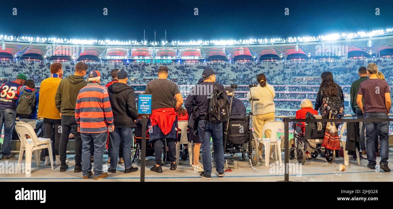 Fans and supporters at Optus Stadium at night lights 2021 AFL Grand Final Perth Western Australia. Stock Photo
