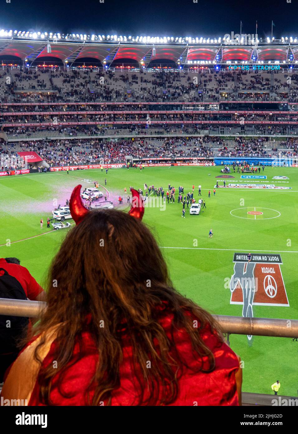 Fans and supporters at Optus Stadium at night lights 2021 AFL Grand Final Perth Western Australia. Stock Photo