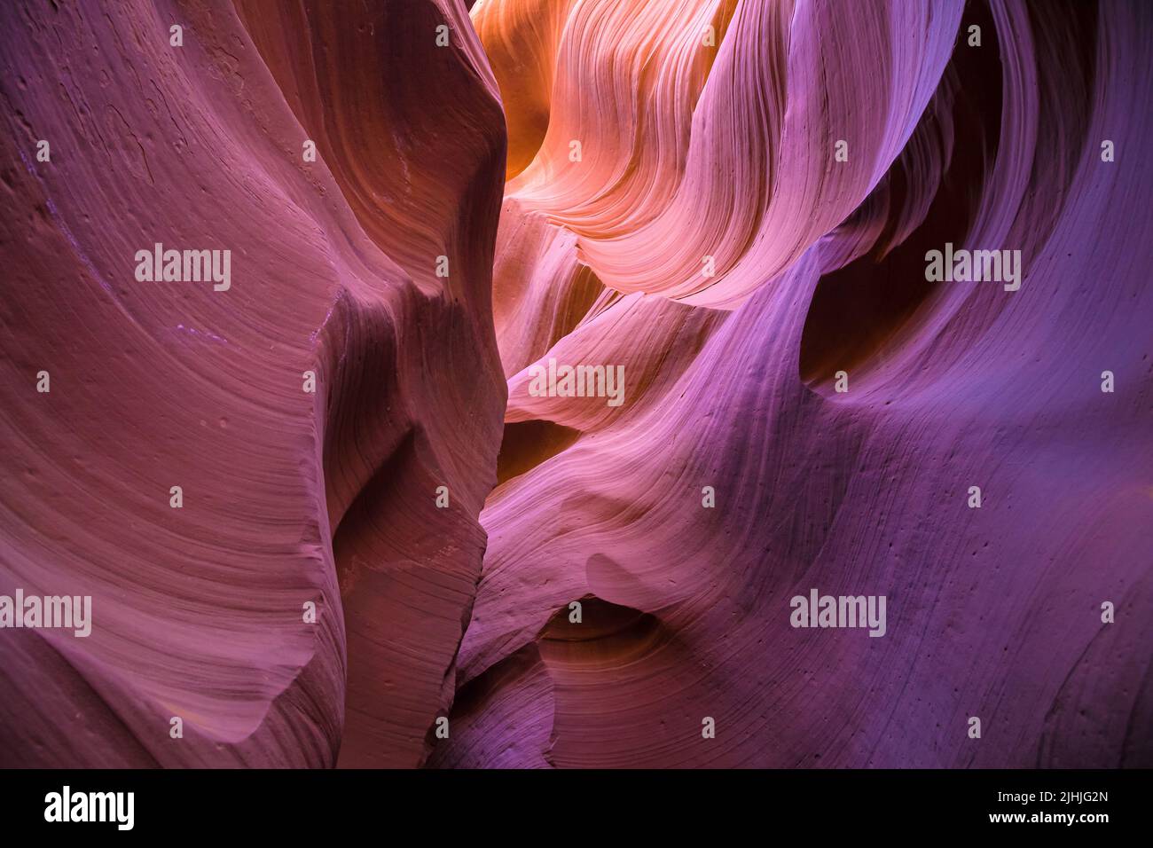 Purple hues on the walls of Lower Antelope Canyon, Arizona, United States. Stock Photo