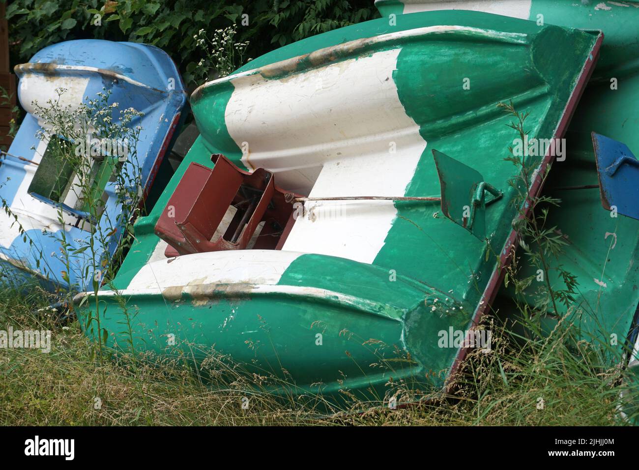 Old water bikes laying upsidedown Stock Photo Alamy