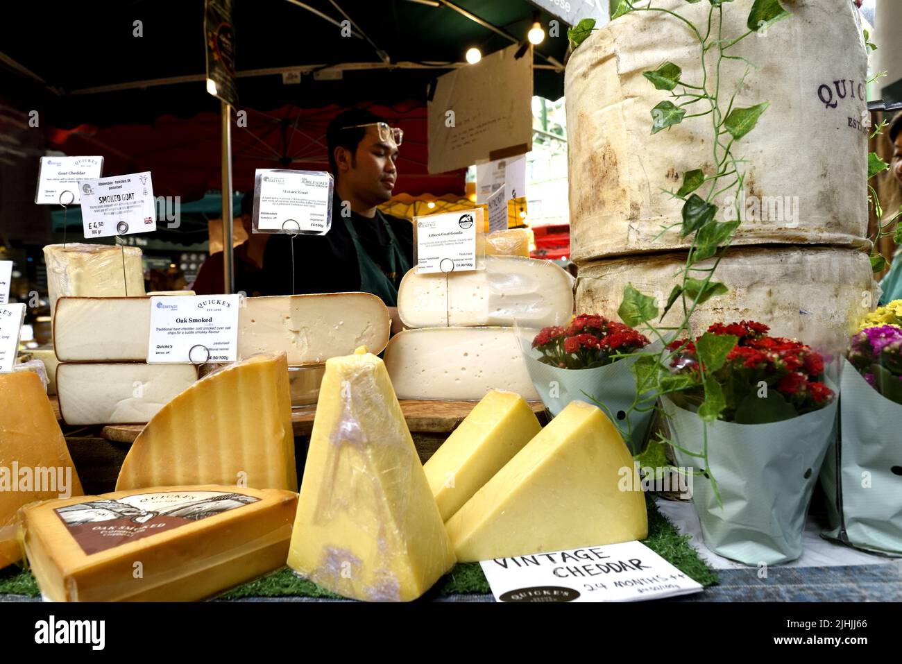 London, England, UK. Borough Market, Southwark. Cheese stall Stock Photo