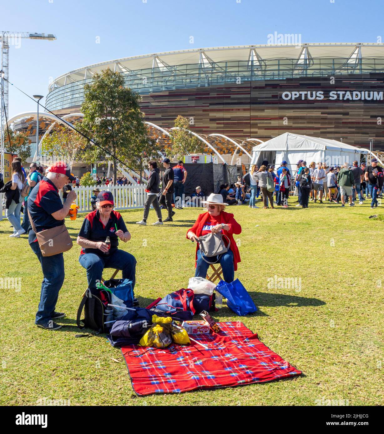 Melbourne Football Club fans outside of Optus Stadium at 2021 AFL Grand Final Burswood Perth Western Australia. Stock Photo