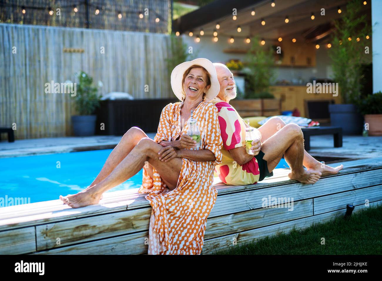 Older woman swimming in pool hi-res stock photography and images - Alamy