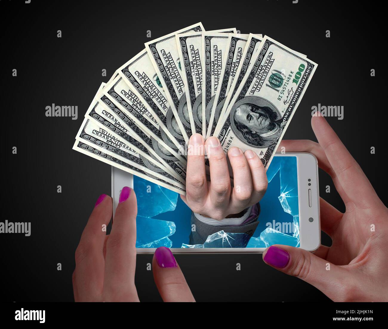 Dollar money popping out from a phone screen. Online payment or reward concept. Stock Photo