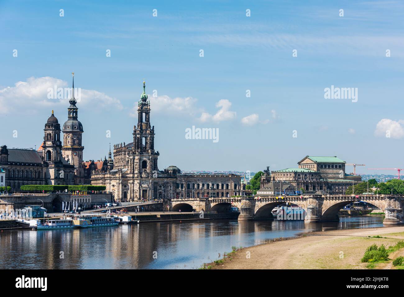 Dresden, Germany, May 2022 View over the Elbe to the baroque old town with the castle, the Catholic Castle Church and the Semperoper Stock Photo
