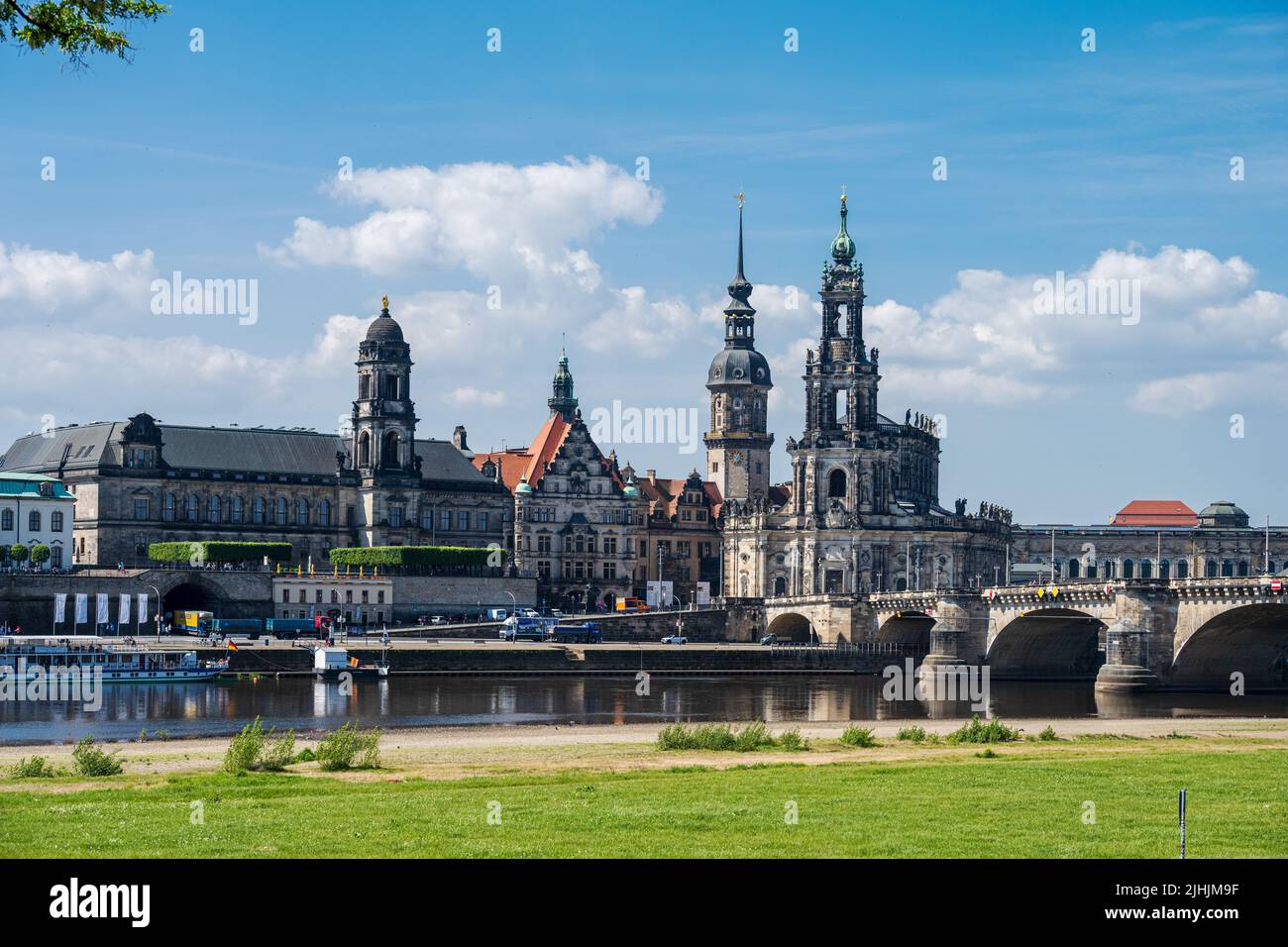 Dresden, Germany, May 2022 View over the Elbe meadows to the baroque buildings of the castle and the catholic castle church Stock Photo