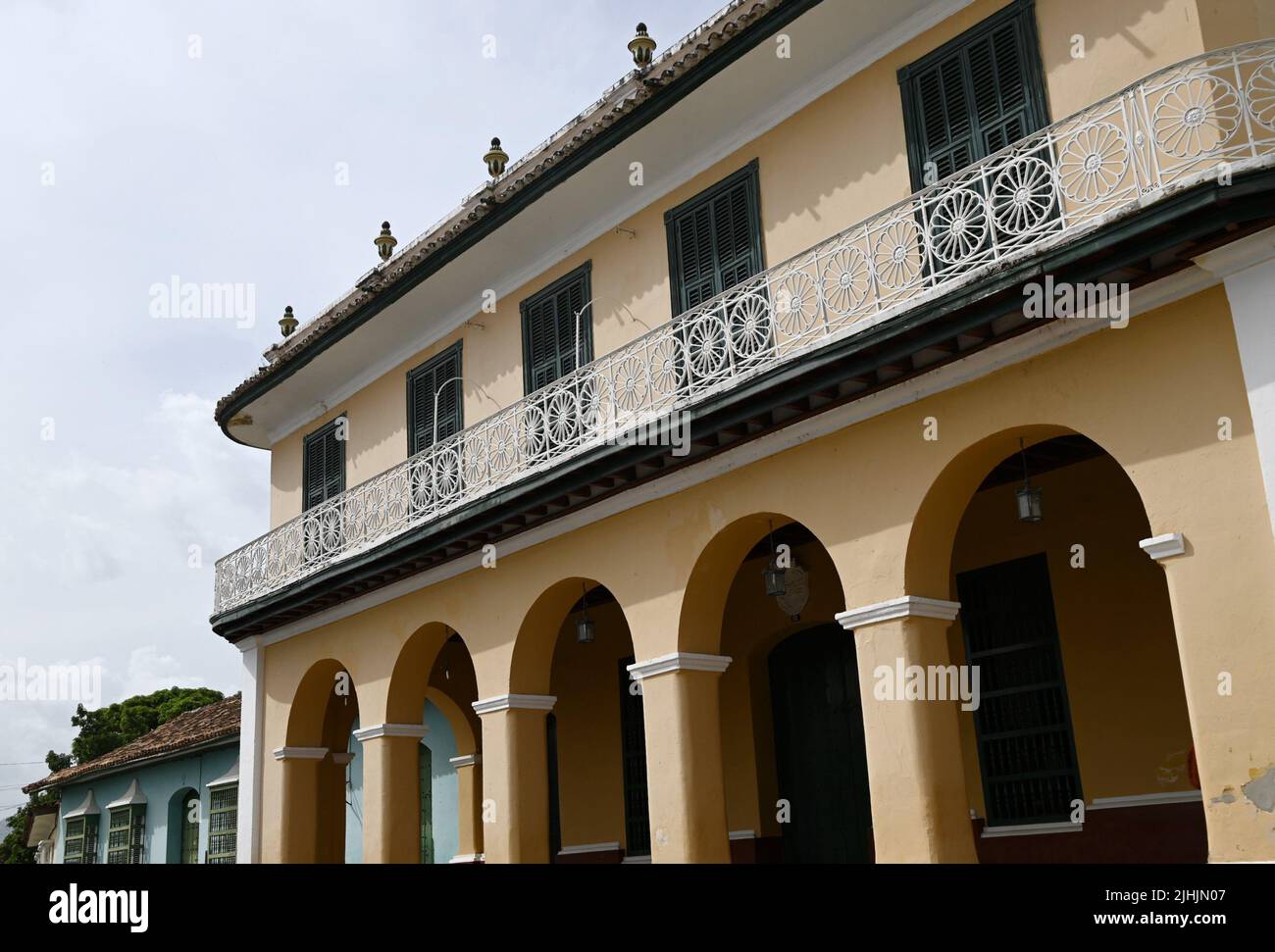 Landscape with scenic exterior view of Spanish Colonial buildings and