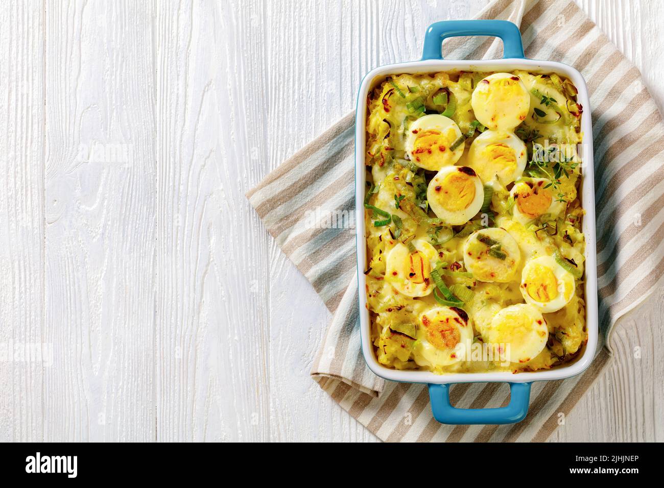 Welsh Anglesey Eggs, soft mashed potatoes with hardboiled eggs all