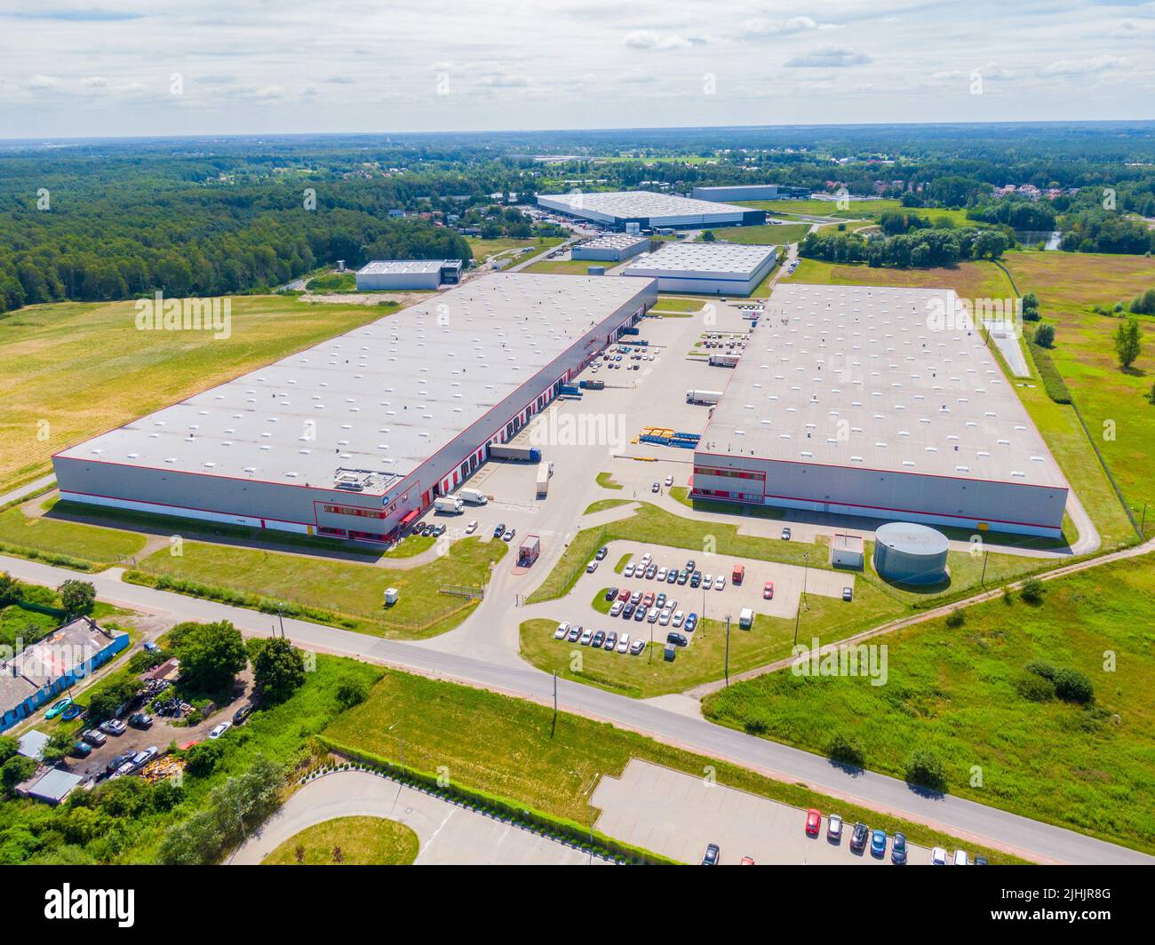 Warehouse storages or industrial factory or logistics center from above ...
