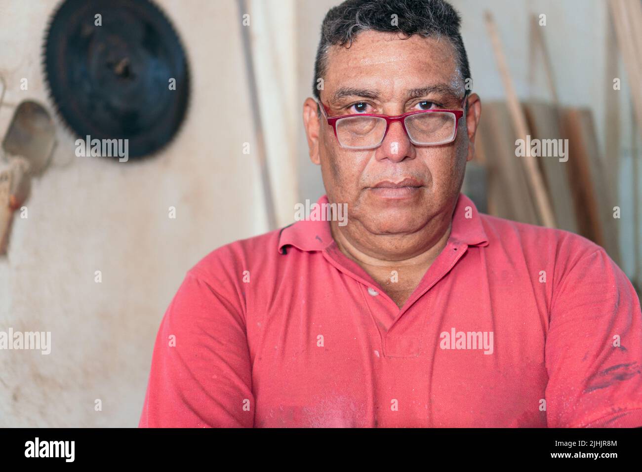 Elderly Carpenter At His Workshop Stock Photo