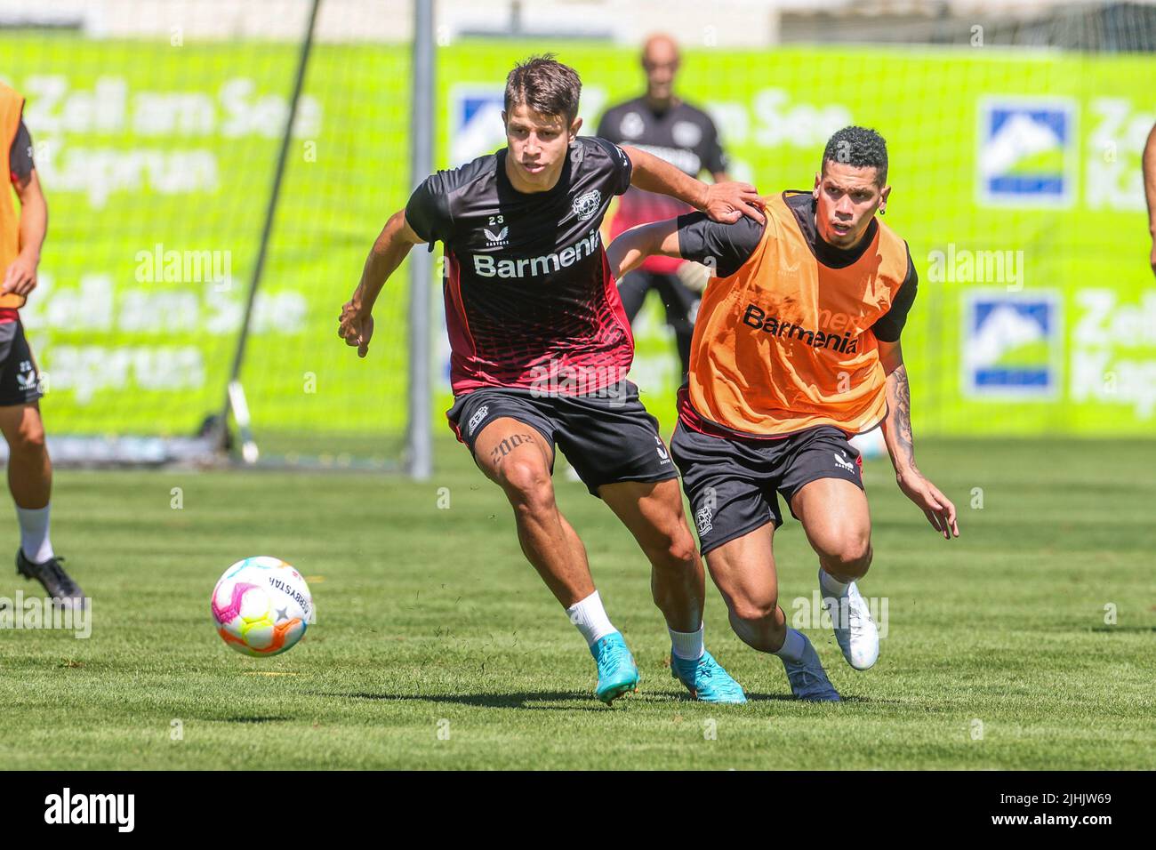 Zell Am See, Austria. 19th July, 2022. Soccer, Bayer 04 Leverkusen training camp: Adam Hlozek (l) in a duel with Paulinho. Credit: Tim Rehbein/dpa/Alamy Live News Stock Photo