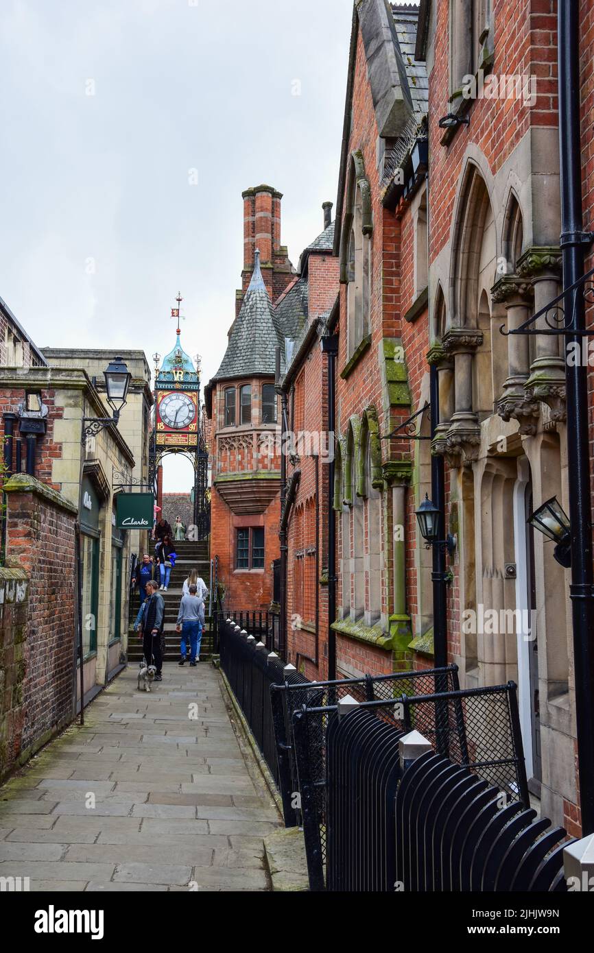 Chester, UK; Jul 3, 2022; Tourists enjoy exploring the Chester City Walls adjacent to the Eastgate Clock. Stock Photo