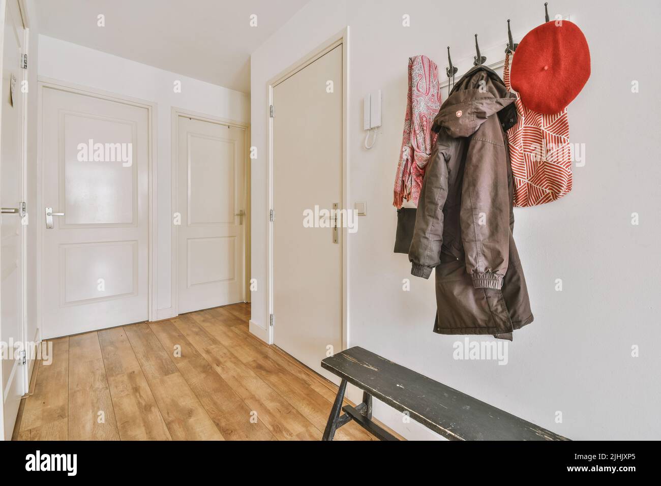 Contemporary luxury design of living room with open kitchen and dining table near window Stock