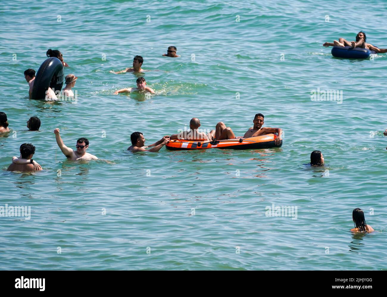 People enjoy the sea in Bournemouth. Britons are set to melt on the hottest UK day on record as temperatures are predicted to hit 40C. Picture date: Tuesday July 19, 2022. Stock Photo