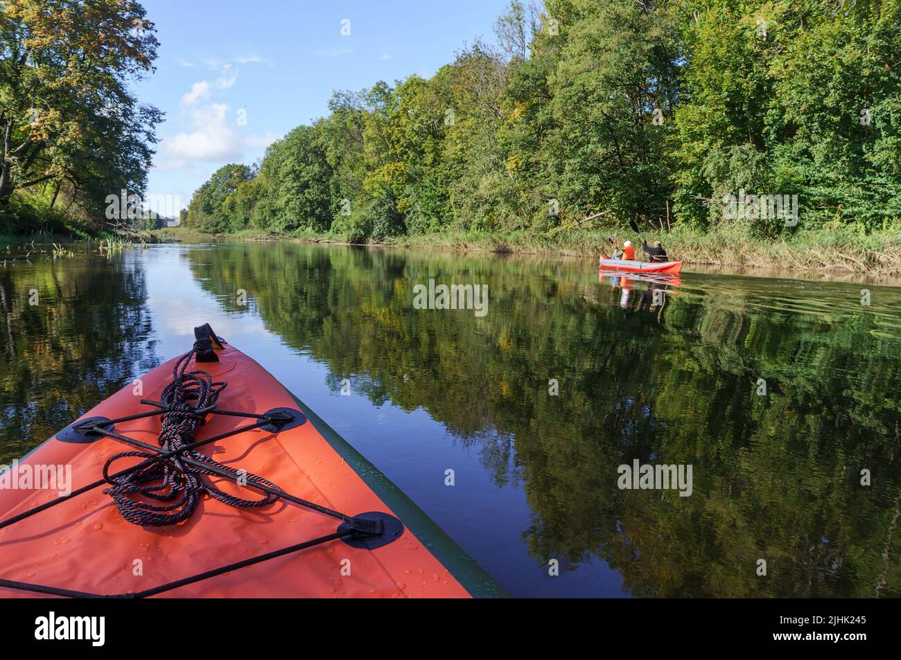 Canoeing trip on the river. Rafting in kayaks. Active recreation on the