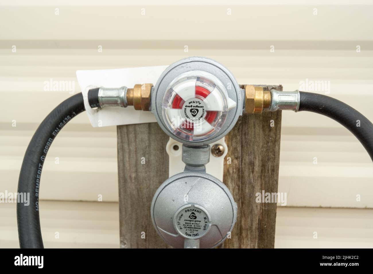 Automatic Changeover valve for propane LPG supplies, allows switching the gas supply from one gas bottle to another without interrupting the supply Stock Photo