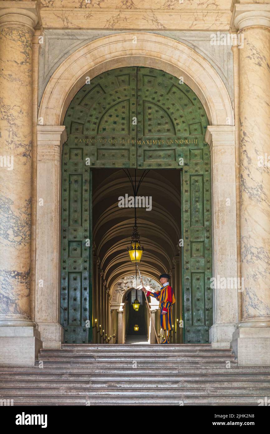 VATICAN CITY, JULY 17 Swiss guard stand at the bronze door of the