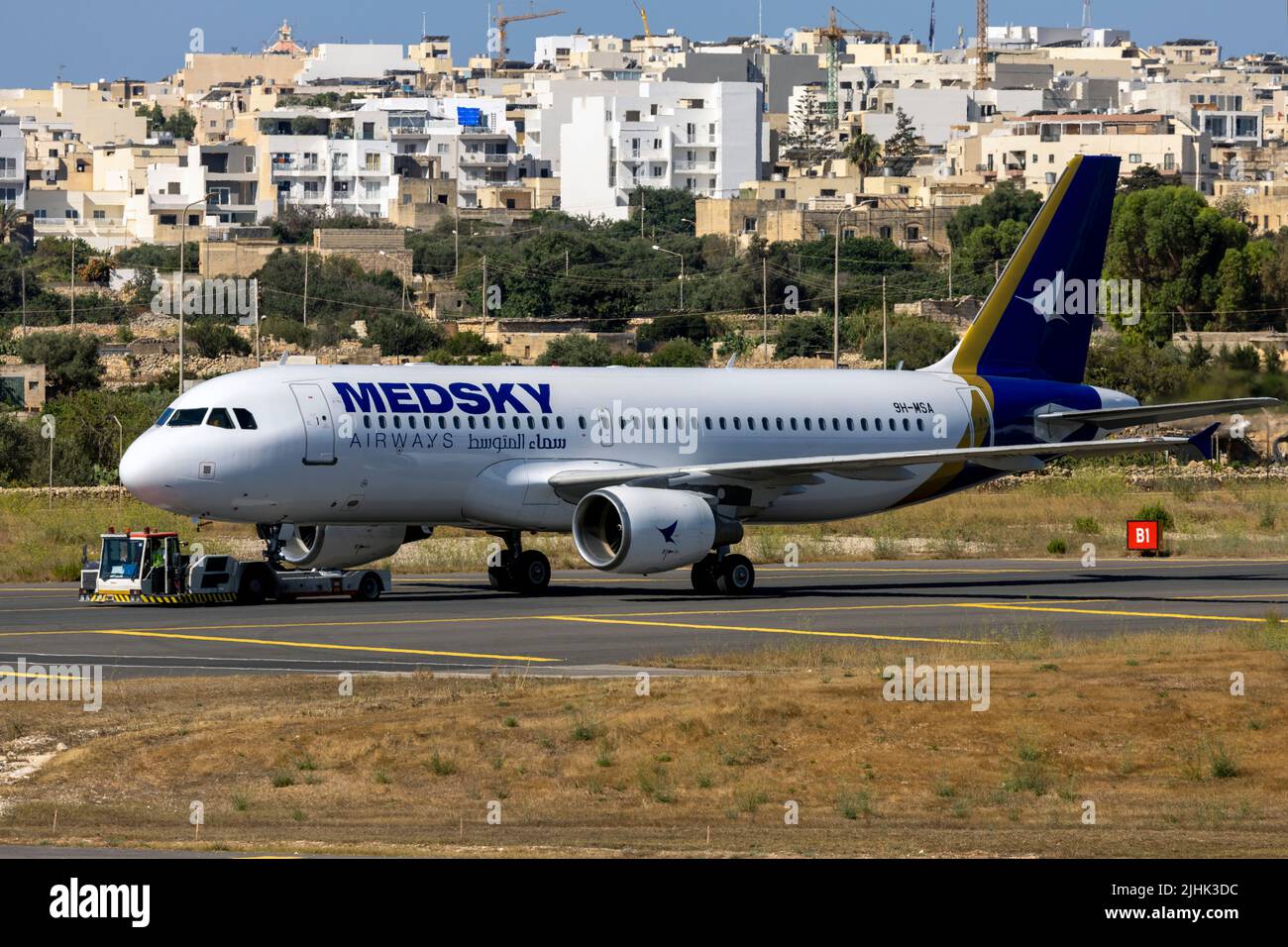 Medsky Airways Airbus A320-214 (Reg: 9H-MSA) departing Malta to operate for Aeritalia. Stock Photo