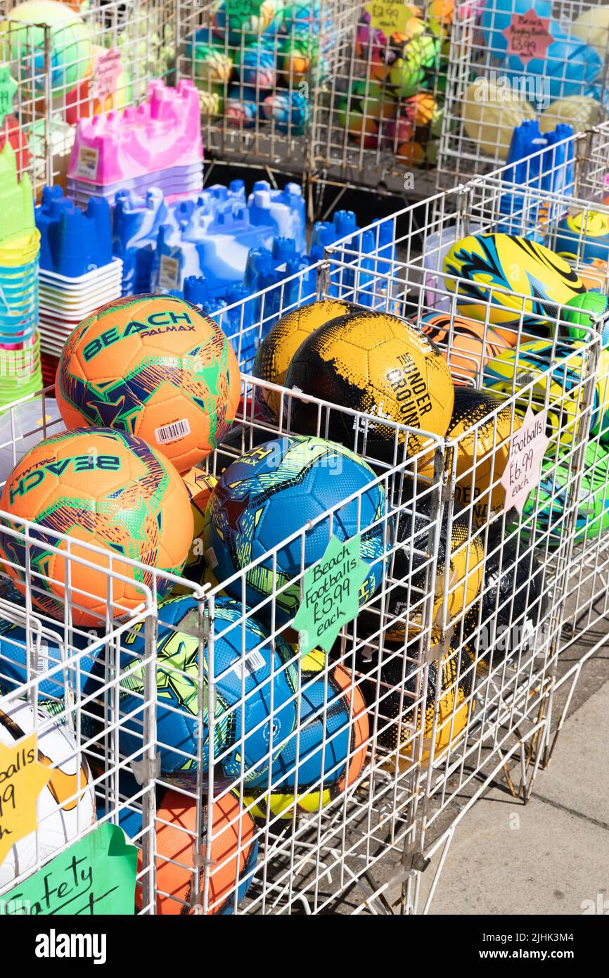 Colourful childrens beach balls and buckets at Seahouses