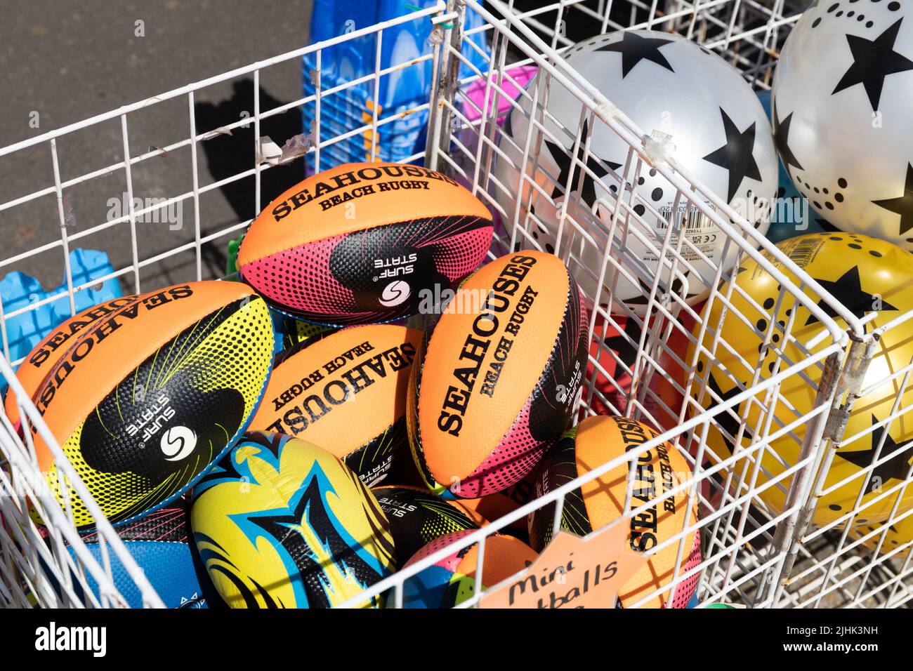Colourful childrens beach balls at Seahouses, Northumberland, England