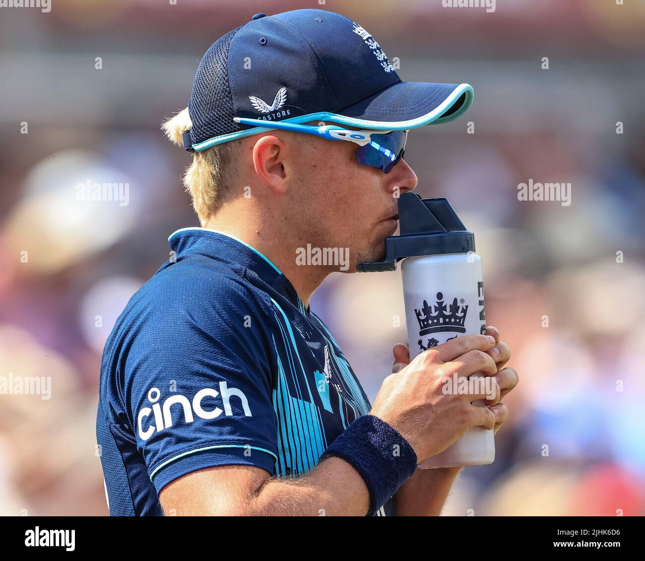Sam Curran of England take water onboard during the hottest day of the year Stock Photo