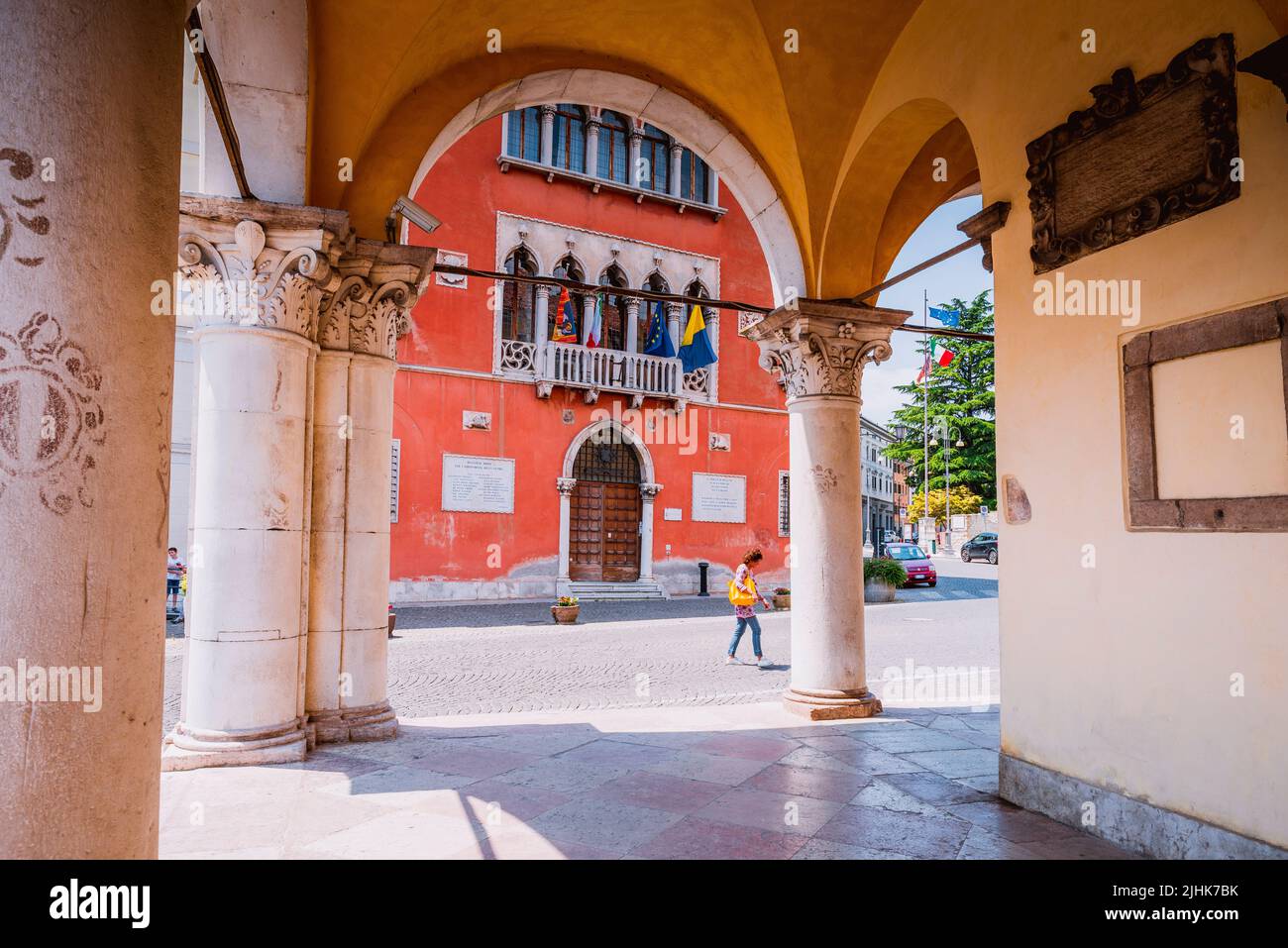Arcades of the Palazzo dei Rettori, in the background Palazzo Rosso. Belluno, Veneto, Italy, Europe. Stock Photo