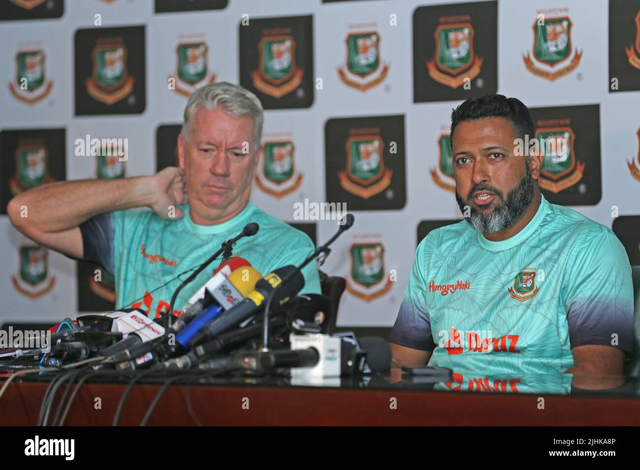 Newly appointed Bangladesh Under 19 Head Coach Stuart Law (L) and BCB Game Development Batting Coach Wasim Jaffer (R) during a media conference at SBN Stock Photo