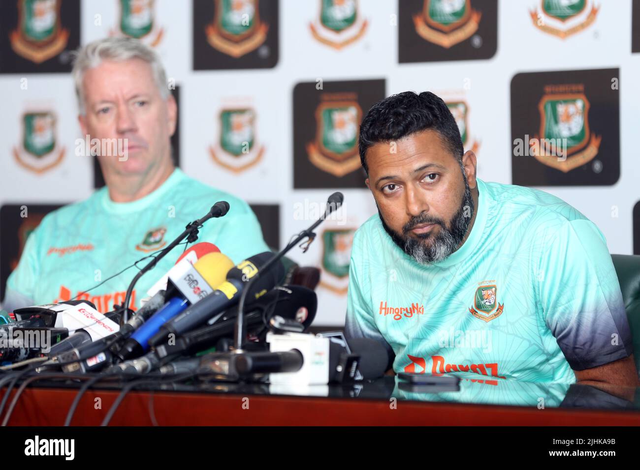 Newly appointed Bangladesh Under 19 Head Coach Stuart Law (L) and BCB Game Development Batting Coach Wasim Jaffer (R) during a media conference at SBN Stock Photo