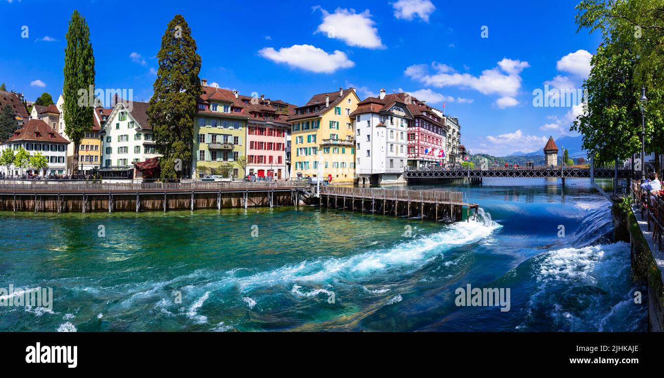 Charming romantic town Luzern, popular tourist attraction in Switzerland. old town with canals and famous wooden bridges Stock Photo