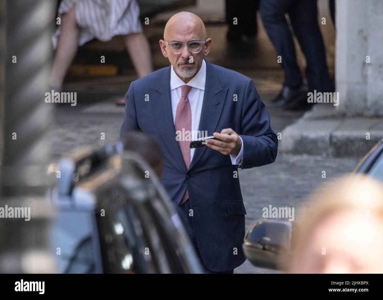 Westminster, London, UK, 19th July 2022, Nadhim Zahawi leaving the Houses of Parliament today and is being challenged by Labour over tax and a £26m business loan. 19th July 2022, Westminster, London, UKCredit: Clickpics, Alamy Live News Stock Photo