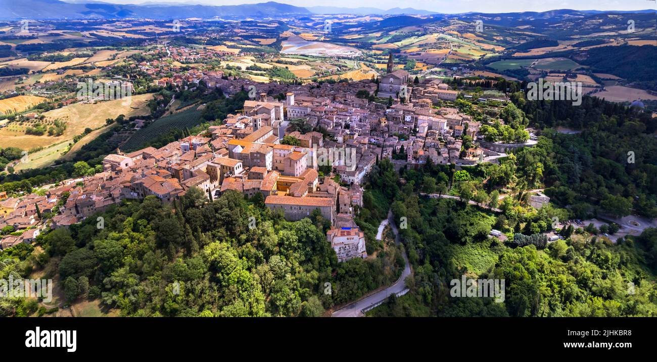 Traditional Italy travel - scenic medeival town Todi in Umbria with beautiful countryside. Panoramic aerial  view Stock Photo