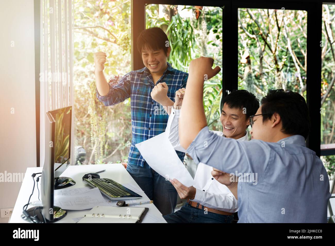 Programmers team happiness and glad in complete success software development project. Developing programming and coding technologies. Website design. Stock Photo