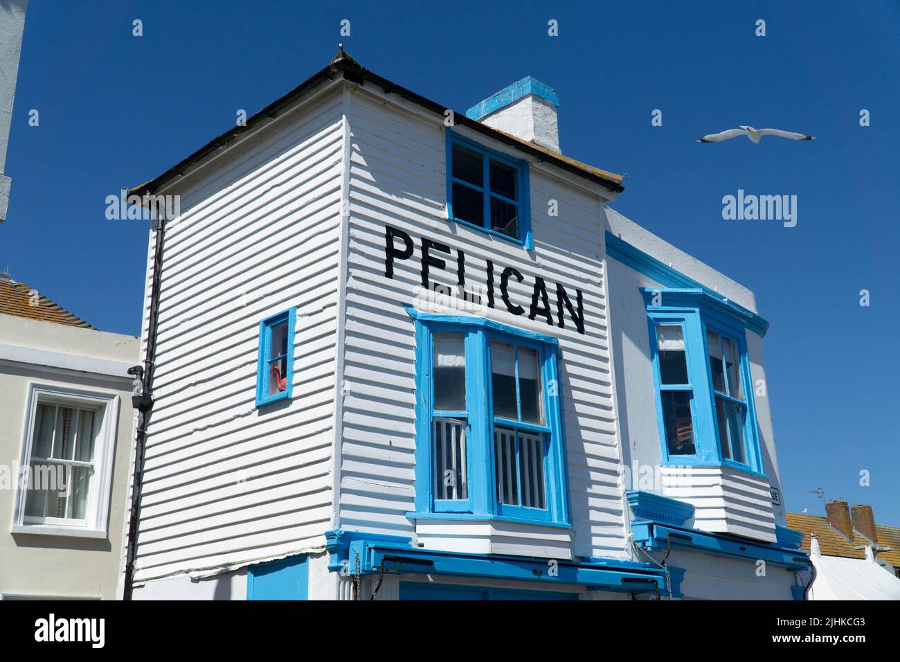 The pelican restaurant hastings England blue sky seagull Stock Photo