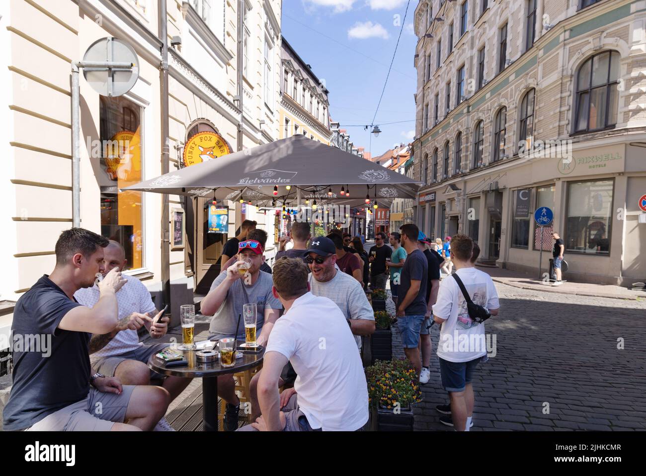 Riga bar; People drinking beer in the daytime at a bar, Riga Old Town, Riga, Latvia Europe. Latvia lifestyle Stock Photo