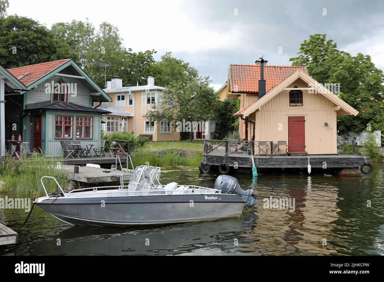 Traditional wooden fishing cottages on the island of Vaxholm in Sweden Stock Photo