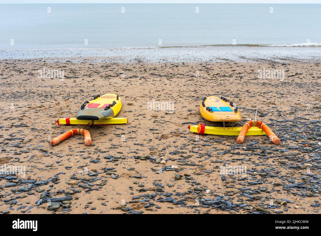 Surf rescue lifeguard boards and floatation devices on the beach Stock