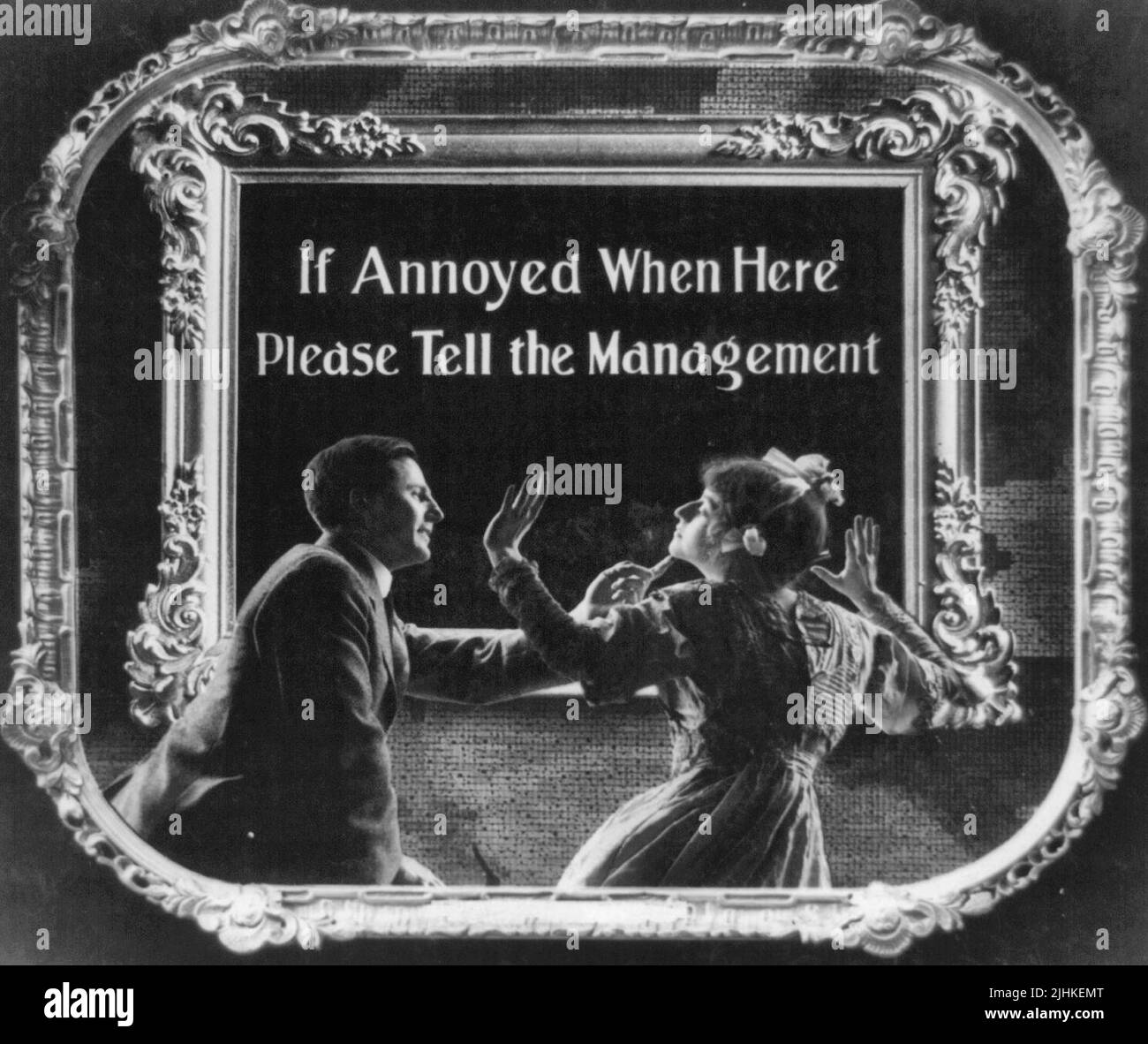 If annoyed when here, please tell the management. Positive paper print from lantern slide used in motion picture theaters as announcement. Stock Photo