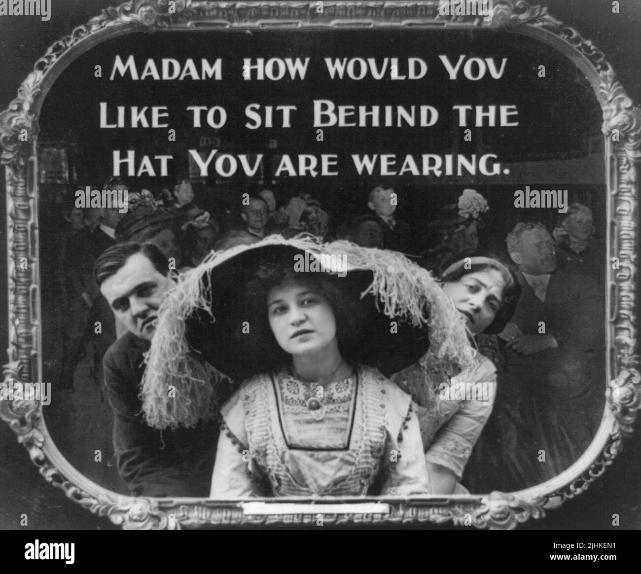 Madam, how would you like to sit behind the hat you are wearing. Positive paper print from lantern slide used in motion picture theaters as announcement Stock Photo