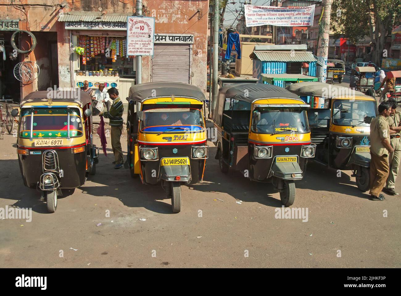 Tuk tuk taxis waiting for passengers on the street Stock Photo