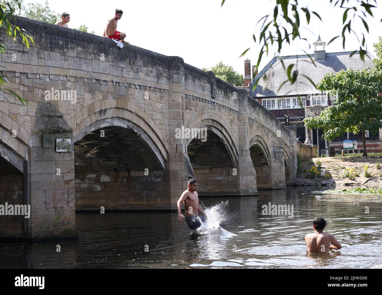 Leicester, Leicestershire, UK. 19th July2022. UK weather. A youth jumps into the River Soar in Abbey Park during record breaking hot weather. The UK has recorded a temperatures of over 40C (104F) for the first time. Credit Darren Staples/Alamy Live News. Stock Photo